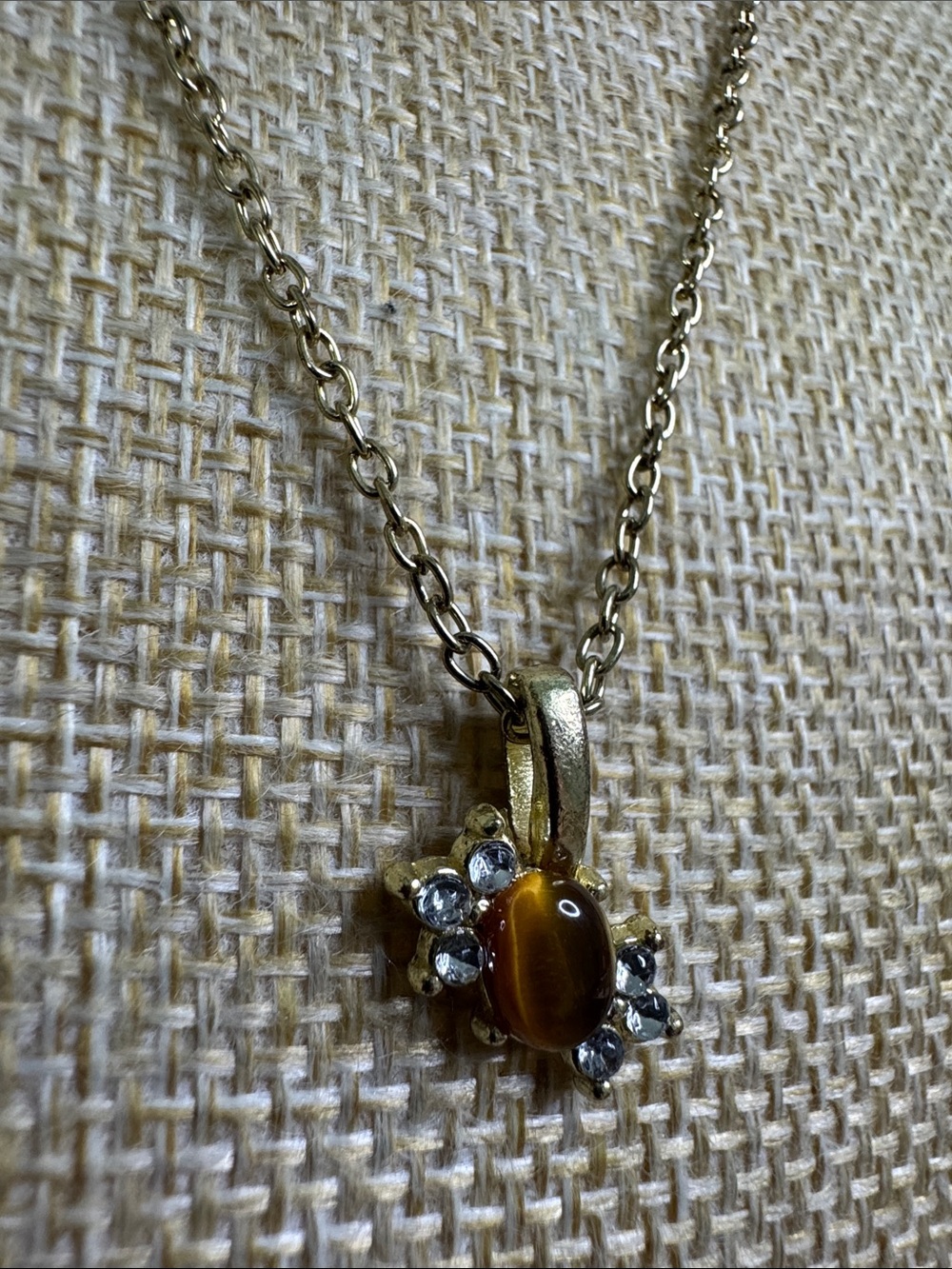 Gold-Tone Brown Cat’s Eye Pendant Necklace with Clear Accent Stones